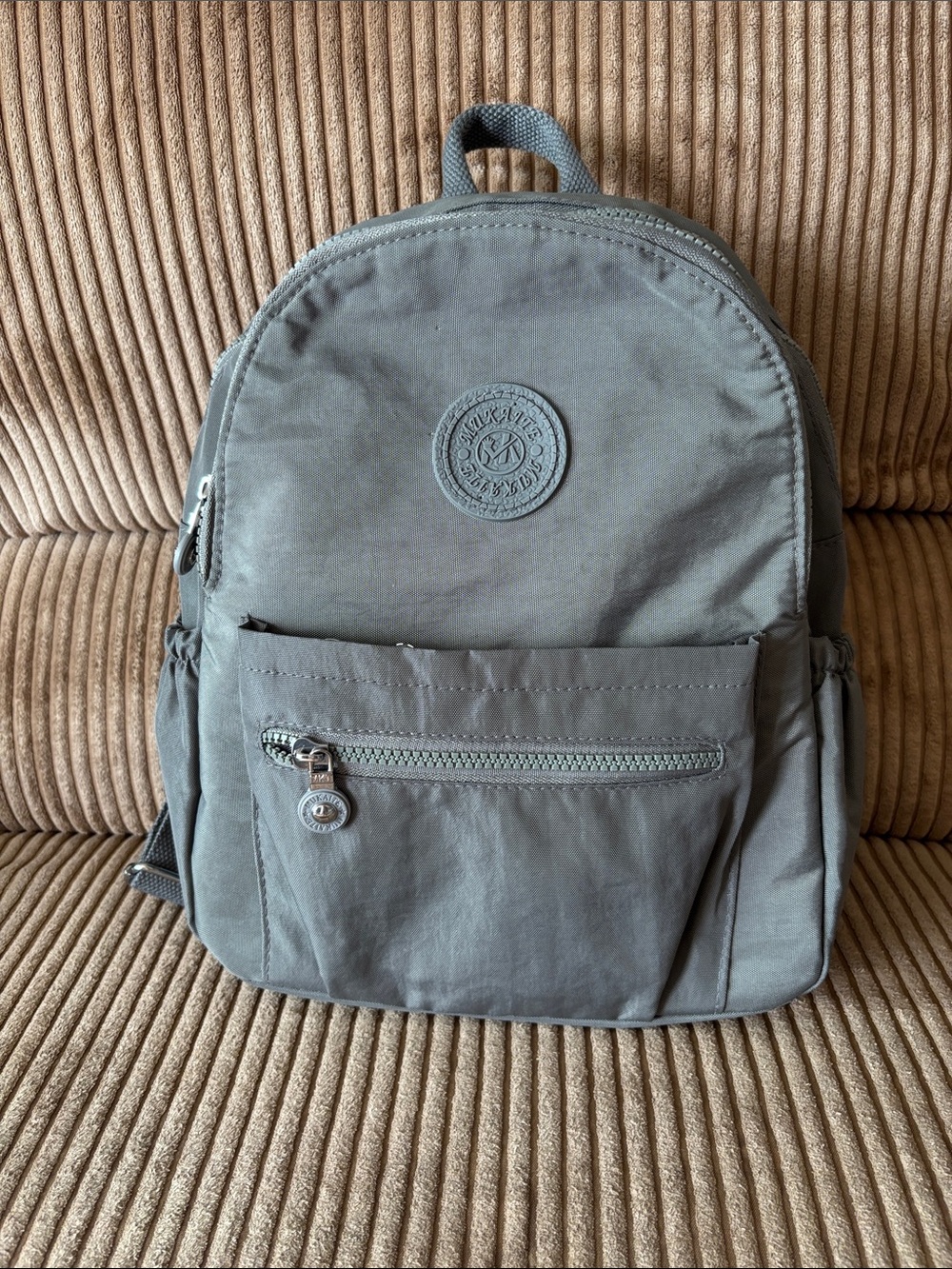 Gray nylon backpack